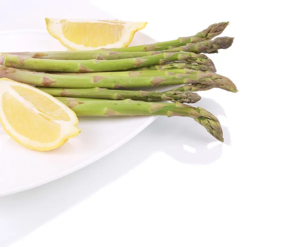 Bunch of asparagus on a plate. — Stock Photo, Image