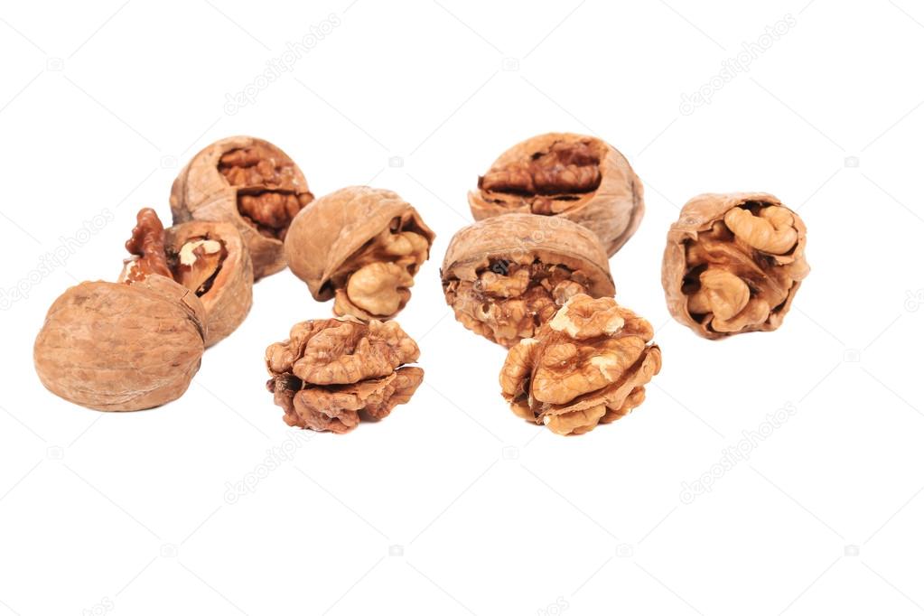 Bunch of cracked walnuts.