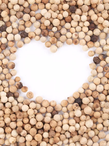 Heart in white pepper. — Stock Photo, Image