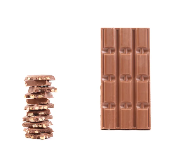 Chocolate and stack with nuts. — Stock Photo, Image
