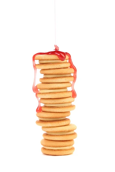 Stack of biscuits with pouring syrup. — Stock Photo, Image