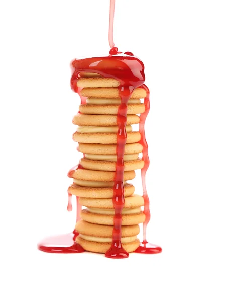 Stack of biscuits with pouring syrup. — Stock Photo, Image
