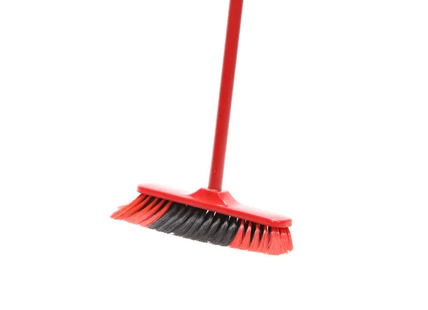 Close up of red black broom. — Stock Photo, Image