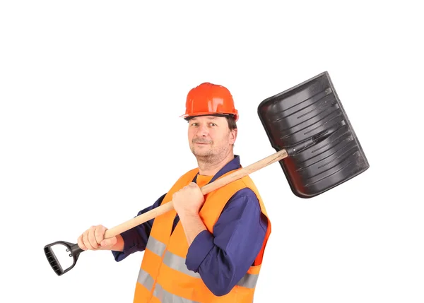 Worker in hard hat holding shovel. — Stock Photo, Image