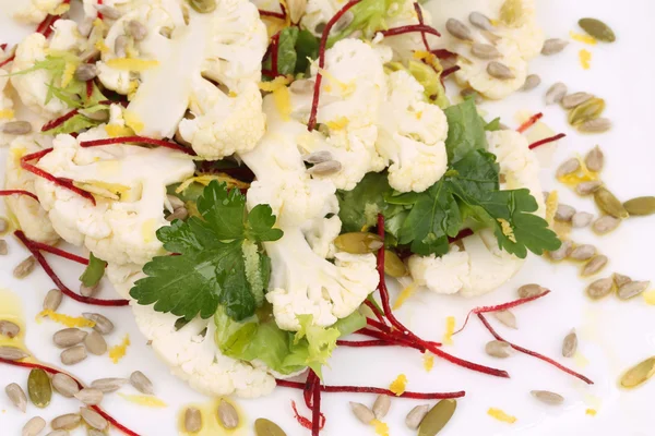 Cauliflower salad with seeds and parsley. — Stock Photo, Image