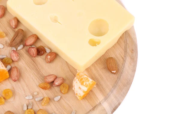 Cheese with raisins and nuts on platter. — Stock Photo, Image