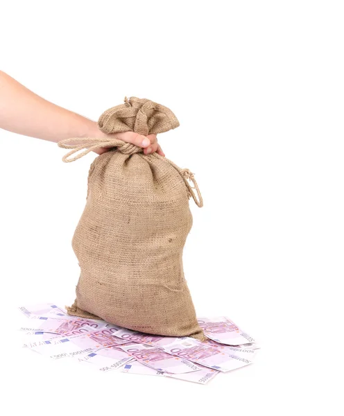 Hand houdt tas met euro-bankbiljetten. — Stockfoto