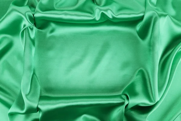 Fundo de seda verde brilhante . — Fotografia de Stock
