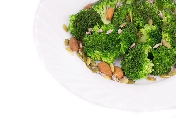 Brokolice salát s semena a ořechy. — Stock fotografie