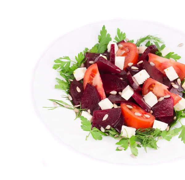 Beet salad with tomatoes and feta cheese. — Stock Photo, Image