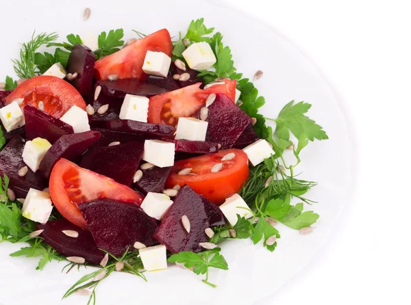 Beet salad with tomatoes and feta cheese. — Stock Photo, Image