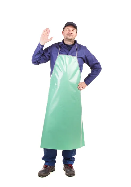Worker wearing blue apron. — Stock Photo, Image