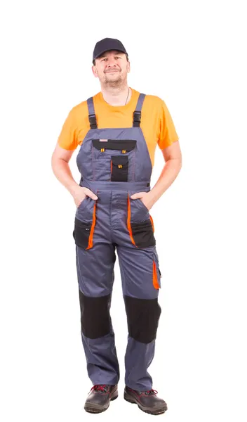 Happy worker wearing overalls. — Stock Photo, Image