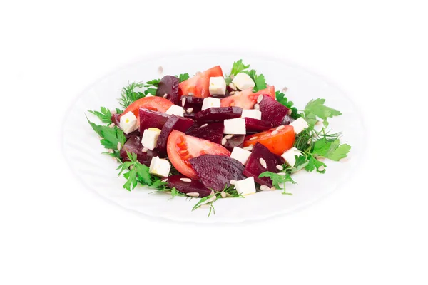 Beet salad with tomatoes and feta cheese. — Stock Photo, Image