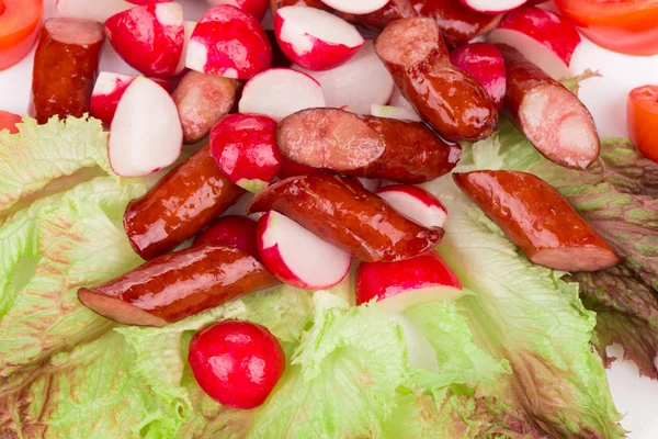 Radish salad with sausage. — Stock Photo, Image