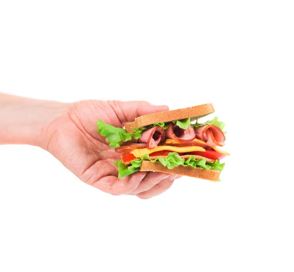 Mano tiene panino tostato francese . — Foto Stock