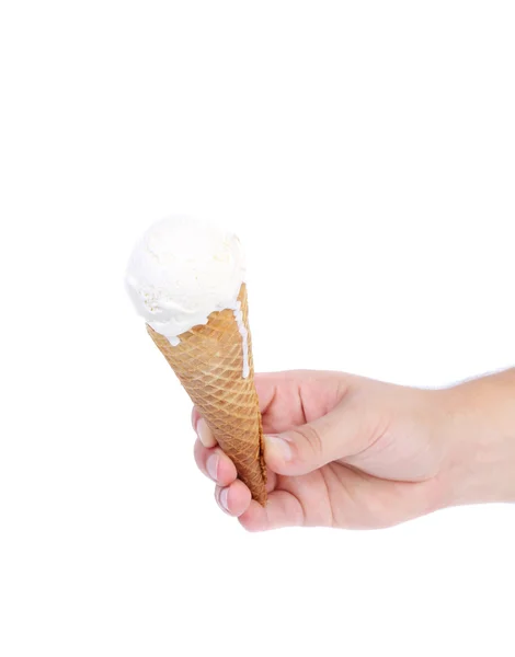 Hand holds cone vanilla ice cream. — Stock Photo, Image