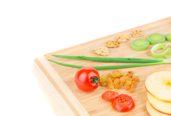 Vegetables on wooden platter. — Stock Photo, Image