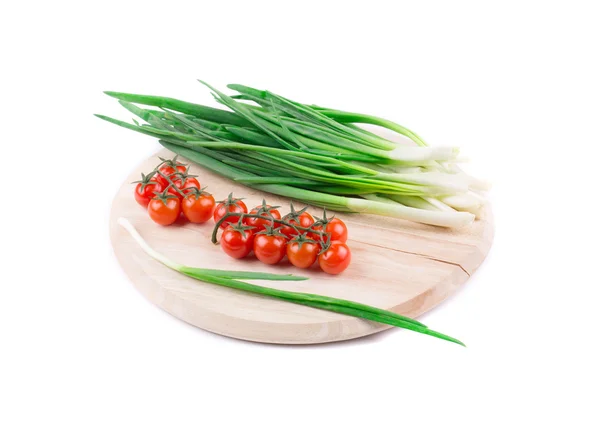 Onions and cherry tomatoes — Stock Photo, Image