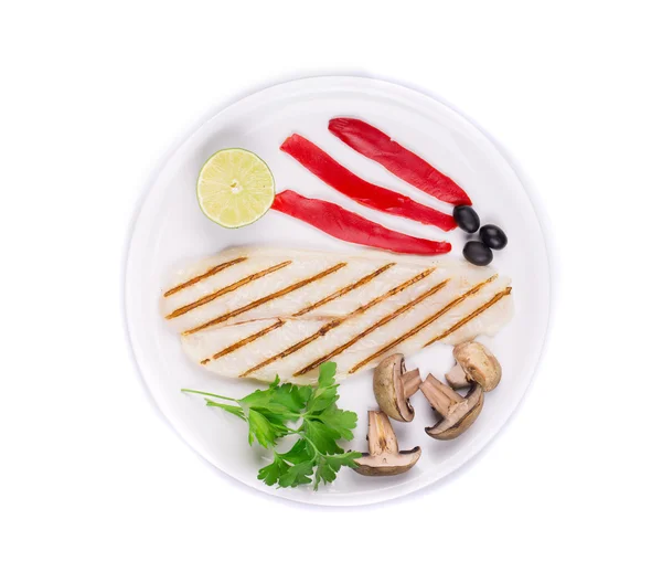 Grilled pangasius fillet on plate. — Stock Photo, Image
