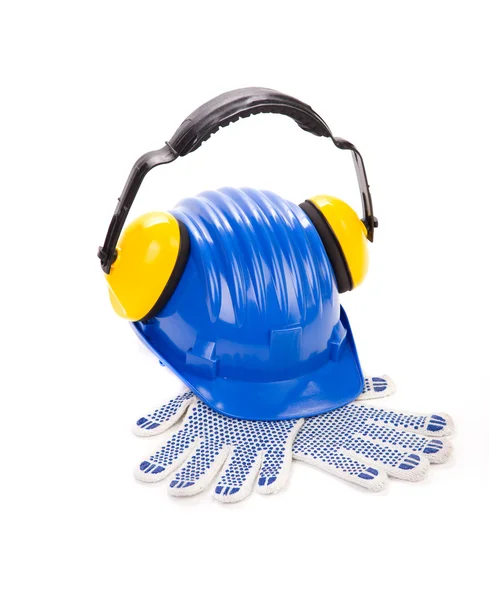 Hjälm med hörselkåpor och handskar. — Stockfoto