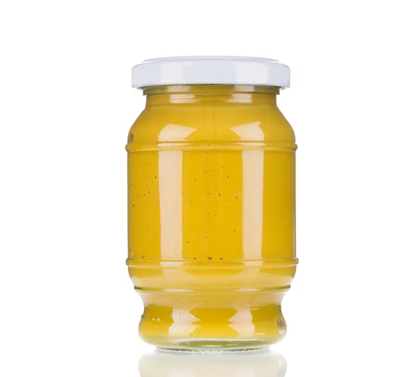 Frasco de vidro cheio de mostarda . — Fotografia de Stock