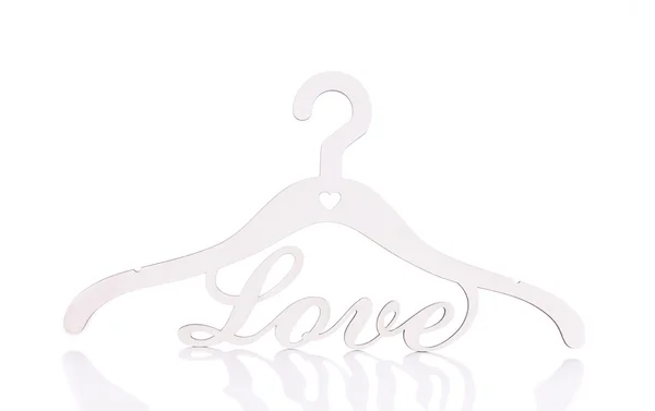 Hanger with the inscription Love. — Stock Photo, Image