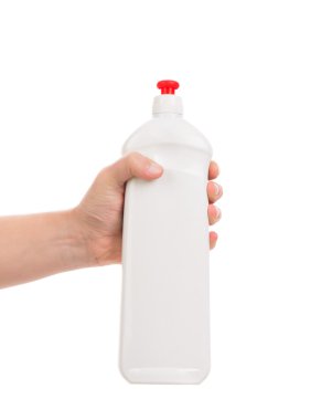 Beyaz plastik şişe tutan el.