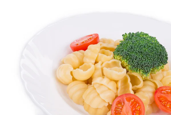 Pasta met broccoli en tomaten. — Stockfoto