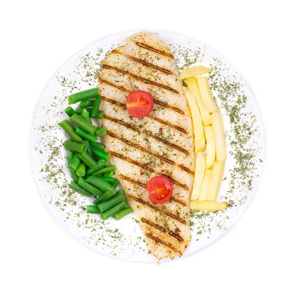 Pangasius with vegetables. — Stock Photo, Image