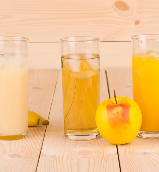 Juices on wood table. — Stock Photo, Image