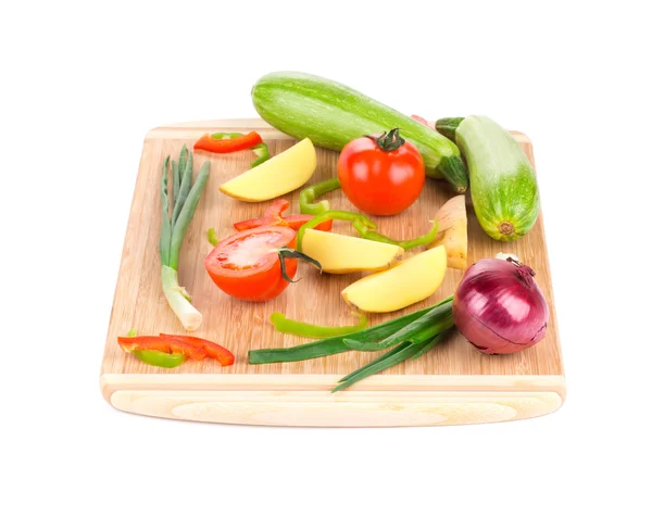 Vegetables on cutting board. — Stock Photo, Image