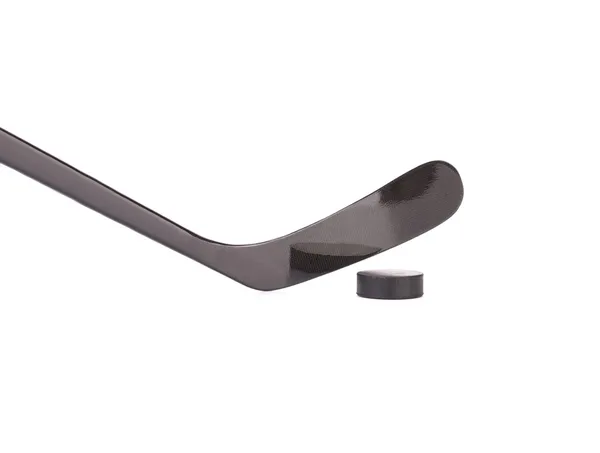 Stick and puck. — Stock Photo, Image