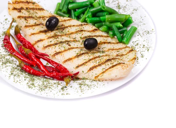 Grilled salmon steak served of peas and red pepper — Stock Photo, Image