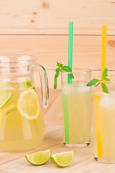 Summer lemonade on wooden background — Stock Photo, Image