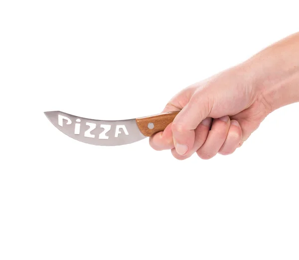 Hand houdt pizza's mes. — Stockfoto