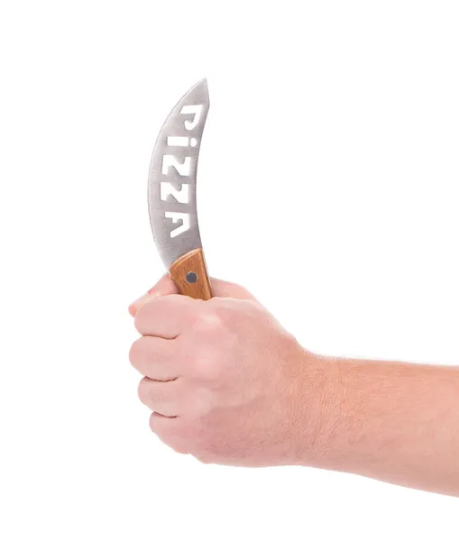 Mão segura faca de pizza . — Fotografia de Stock