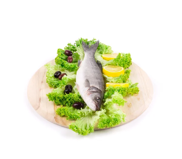 Fresh fish on the cutting board — Stock Photo, Image