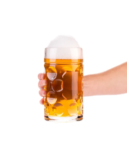 Frosty glass of beer with hand. — Stock Photo, Image