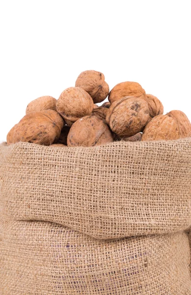 Nueces en bolsa de arpillera . — Foto de Stock