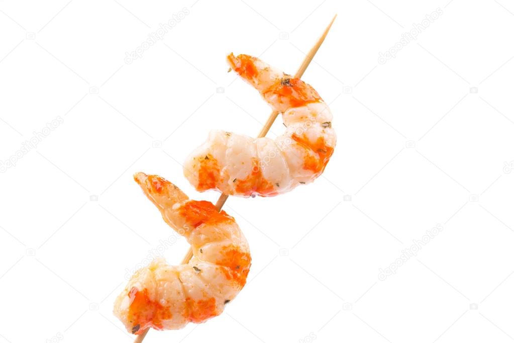 Shrimps on skewers.