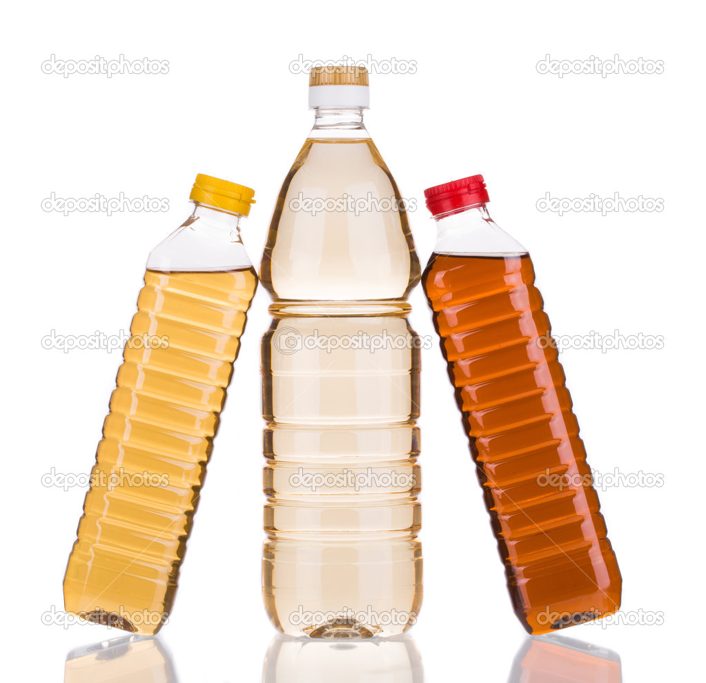 Three bottles of vinegar.
