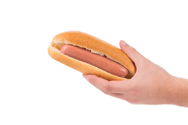 Hand met hotdog. — Stockfoto