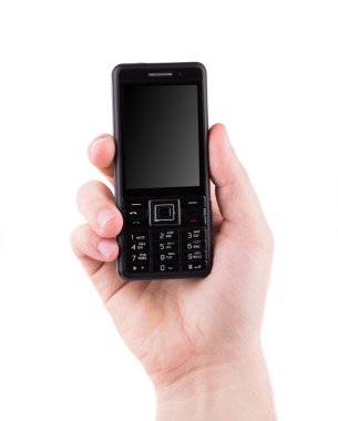 El ele tutuşan cep telefonu.
