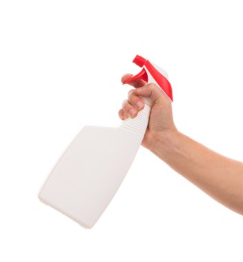 El ele tutuşan sprey şişesi.