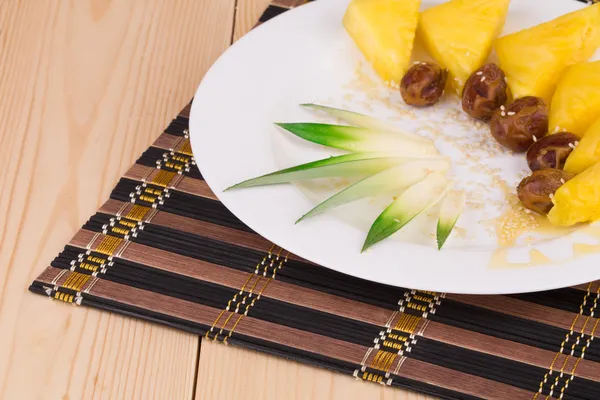 Pineapple and dates — Stock Photo, Image