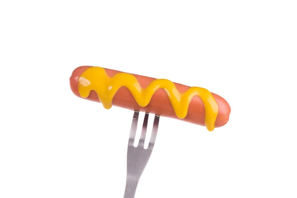 Grilled sausage on a fork. — Stock Photo, Image