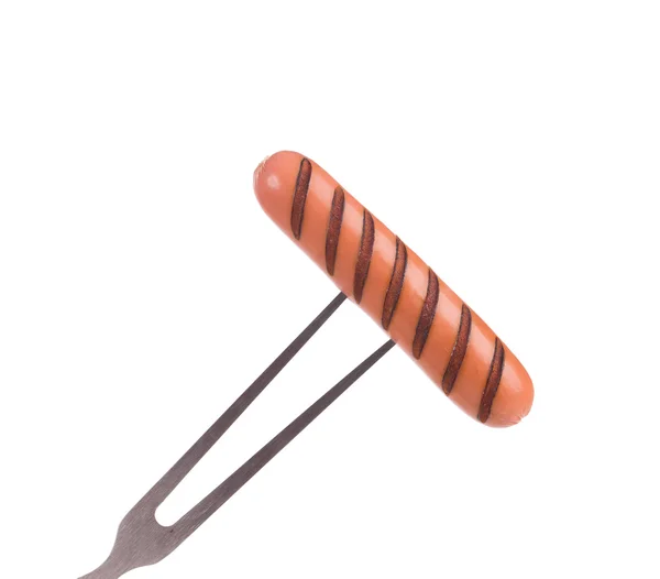 Grilled sausage on a fork. — Stock Photo, Image