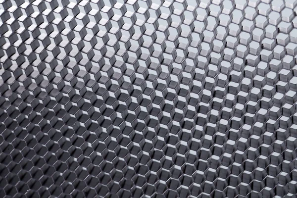 Honeycomb grid against grey background. — Stock Photo, Image