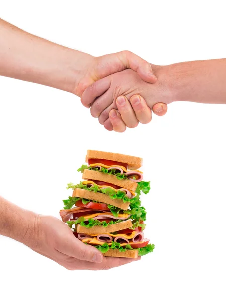 Sandwich in hand — Stock Photo, Image